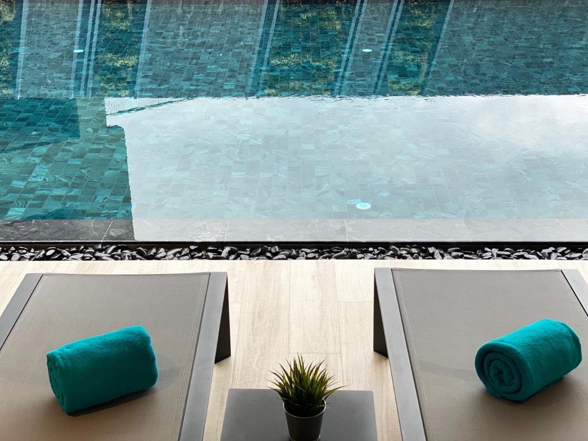 The Oceanic Sportel Phuket - Sha Extra Plus Kültér fotó The swimming pool at the hotel