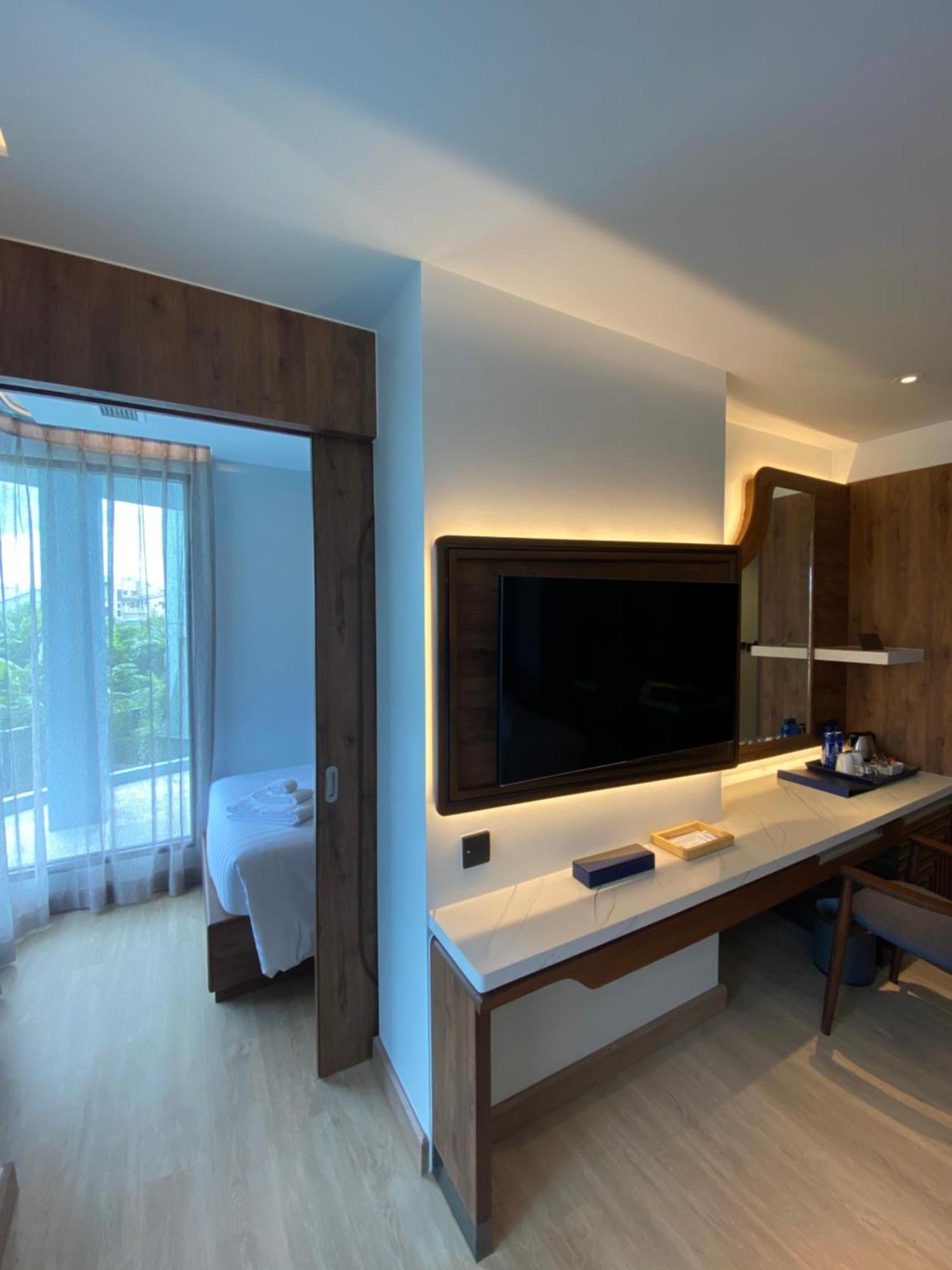 The Oceanic Sportel Phuket - Sha Extra Plus Kültér fotó A room at the hotel